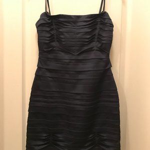 BCBG Strapless luxurious navy dress, strapped optional. Body contour material.